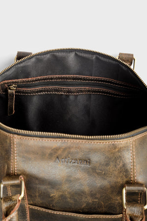 Interior with zippered wall pocket and Artizanni embossed logo