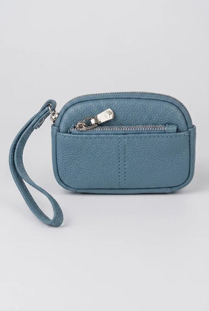 Blue coin pouch wristlet angled view showing zip pull and strap