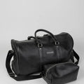 Black top grain leather duffel bag MK 083 shown with matching leather dopp kit