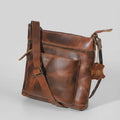 Vintage brown leather satchel AZ 060 angled view showing stitching