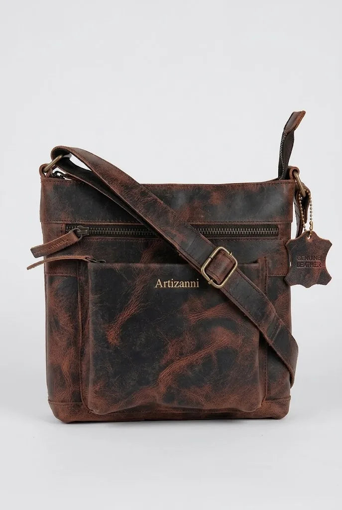 Brown crazy horse leather satchel AZ 060 with strap draped over the bag