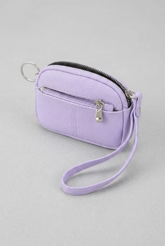 Small coin purse wristlet in lilac purple with zip closure and key ring
